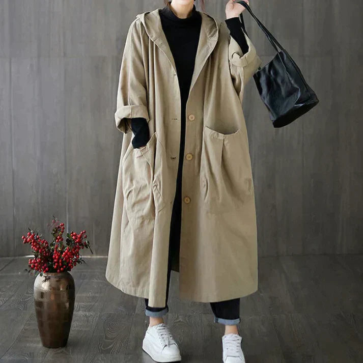 Stijlvolle oversized dames trenchcoat, weerbestendig en elegant. Perfecte klassieke jas voor elk seizoen.