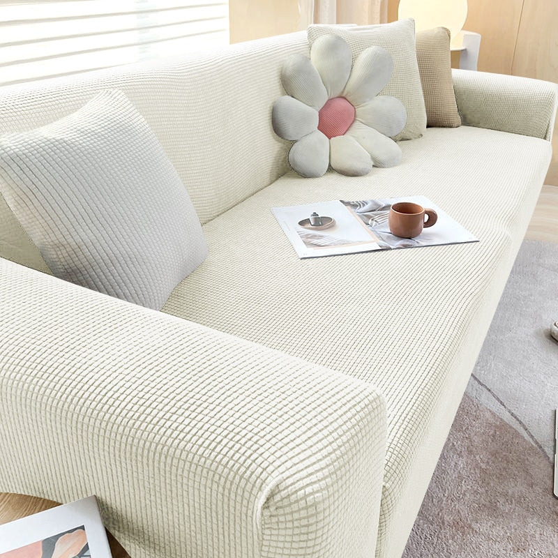 Vernieuw je woonkamer met deze rekbare bankhoes. Stijlvol interieur en optimale bescherming.