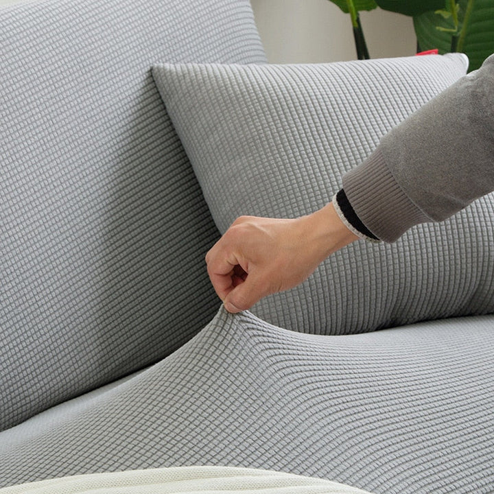 Eenvoudig te plaatsen stretch bankhoes. Perfect voor een snelle interieurverandering en bescherming.