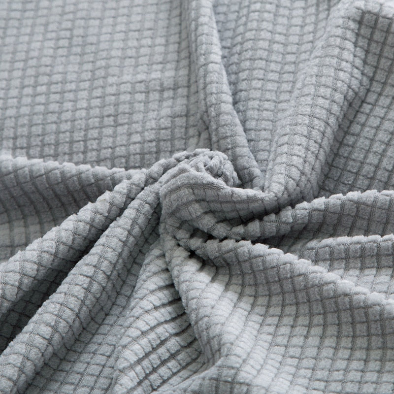 Wasbare bankhoes met stretch. Comfortabele, vlekbestendige bescherming voor je woonkamerbank.