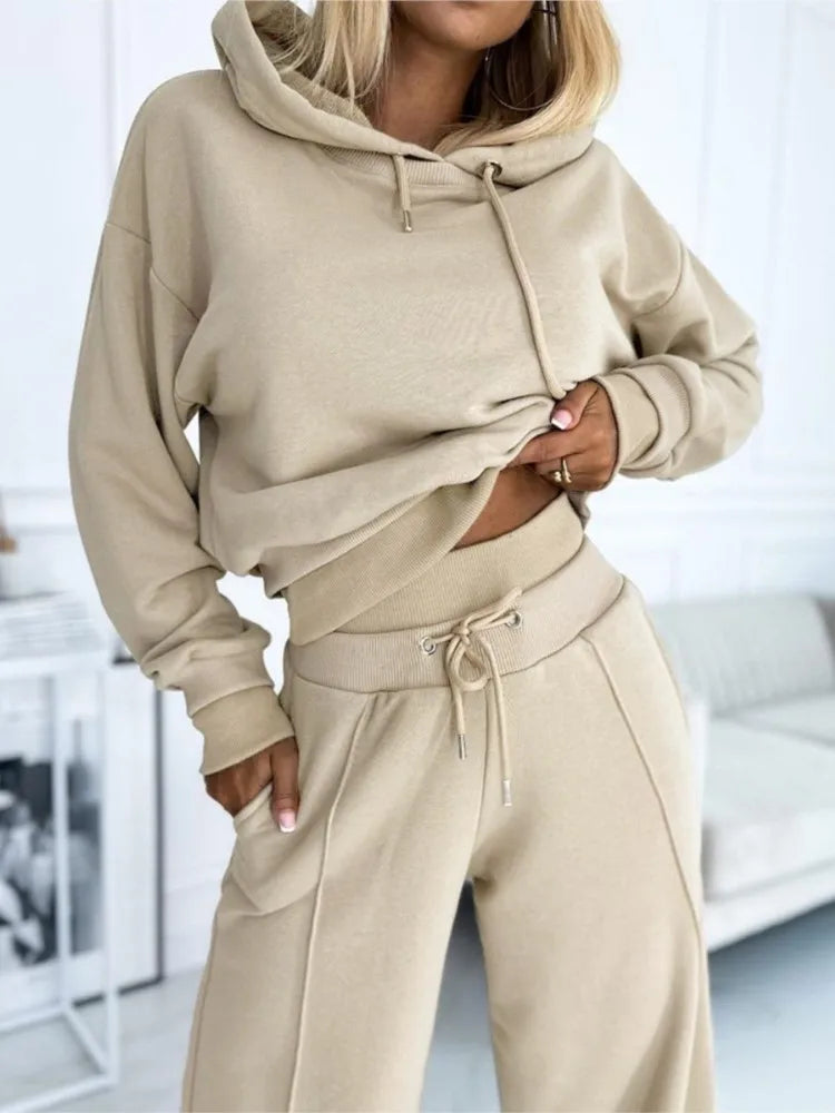 Stijlvolle tweedelige dames jogging loungeset met hoodie en wijde pijpen, comfortabel vrijetijdspak.