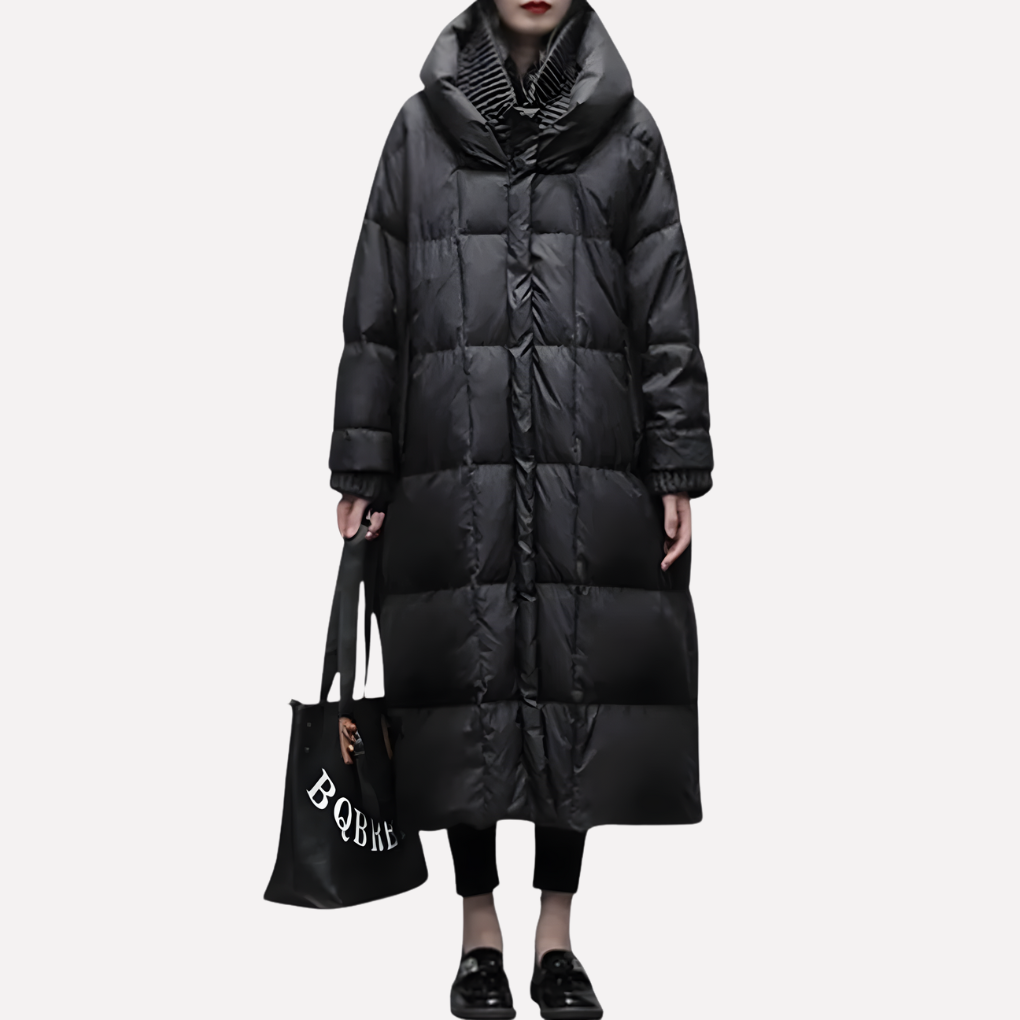 Stijlvolle, warme lange gequiltede damesjas. Ideaal als winterjas of tussenjas voor elegante damesmode.