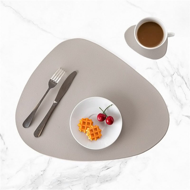 Complete Tablevo placemat set met leren onderzetters, modern design. Ideale tafelbescherming en decoratie voor eetkamer.