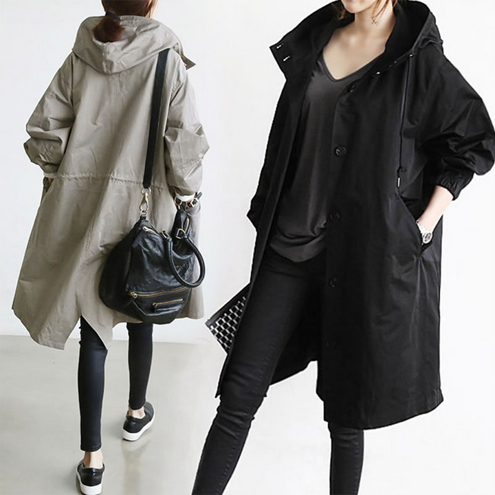Stijlvolle waterdichte dames buitenkleding met capuchon, de ideale halflange regenjas voor elke vrouw.