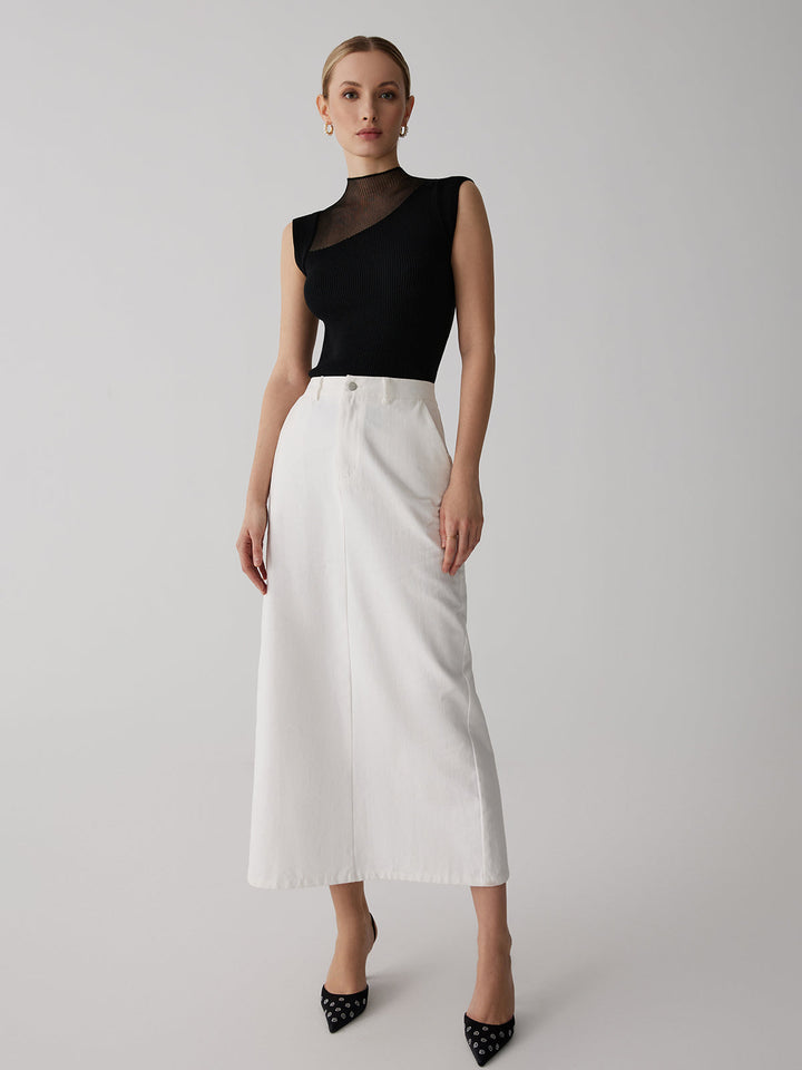 Volledige outfit met het mouwloze geribbelde damesshirt gecombineerd met een witte rok