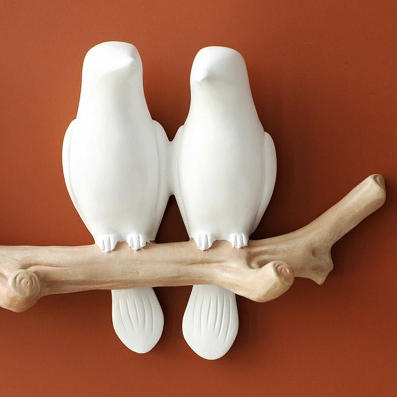 Decoratieve wandhaak met een charmant vogelontwerp, ideaal voor jassen, hoeden en accessoires.