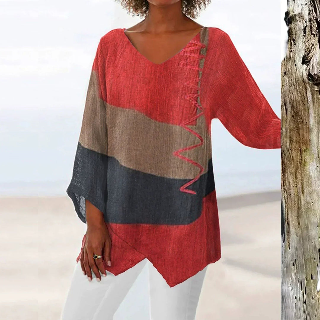 Trendy dames colorblock blouse met lange mouwen en V-hals, ideaal voor een stijlvolle, casual look in lente/herfst.