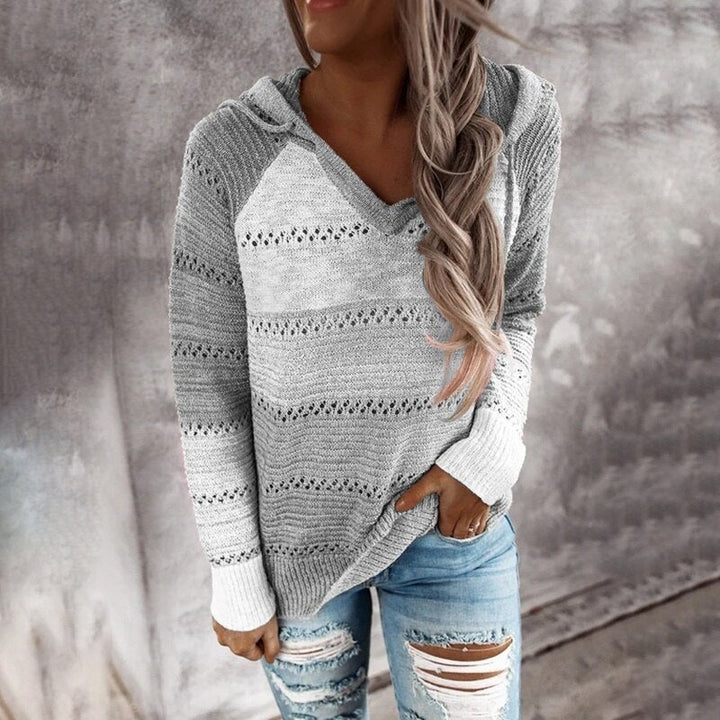 Stijlvolle dames capuchon sweater met patchwork details, trendy en zeer comfortabel.