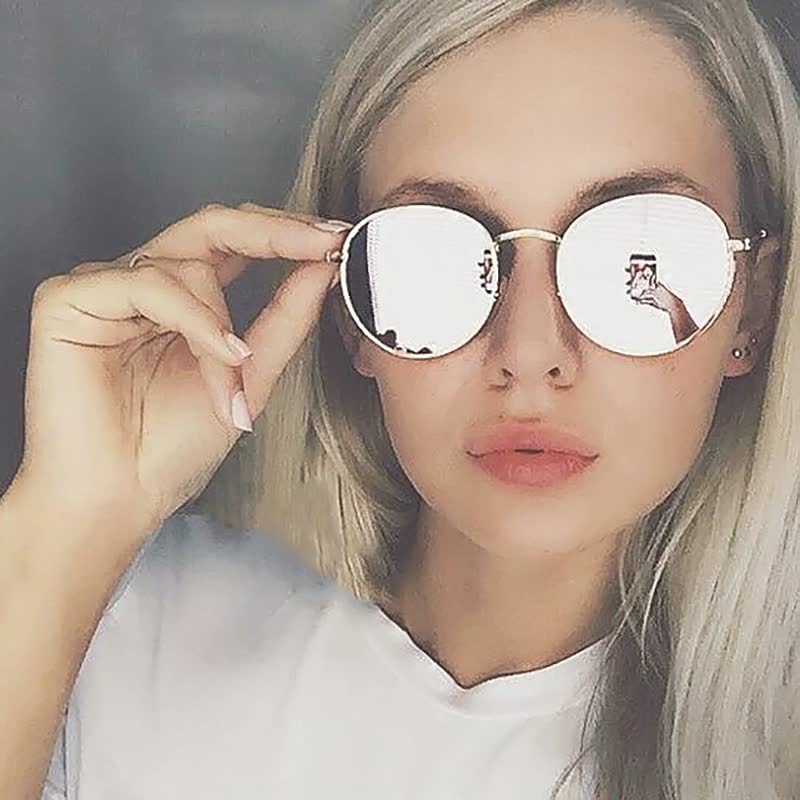 Roze retro dameszonnebril, trendy mode-accessoire voor een stijlvolle en zomerse look. UV-bescherming.