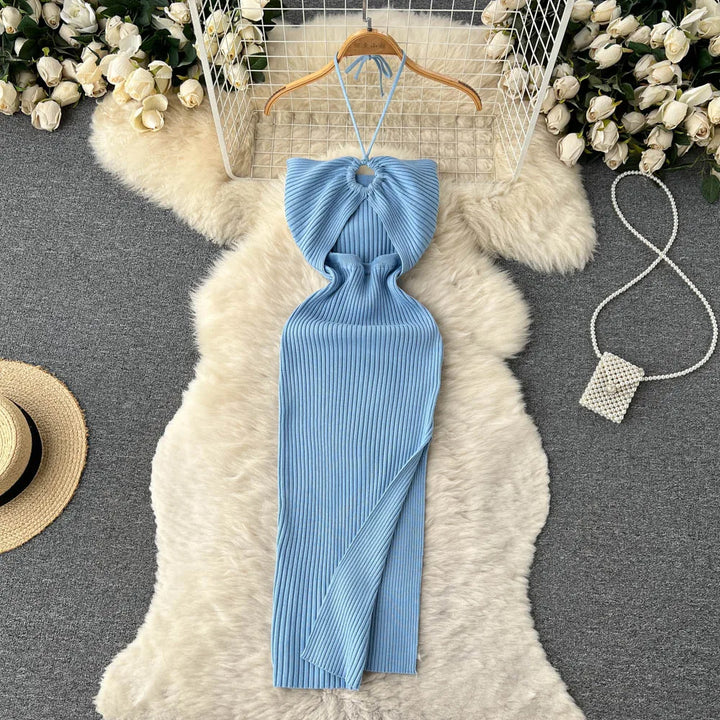 Trendy maxi jurk met rugloos detail en sexy zijsplit. Een must-have voor de modieuze vrouw.