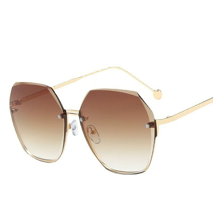 Grote glazen dames zonnebril, trendy mode statement, perfect voor stijlvolle zomerse outfits.