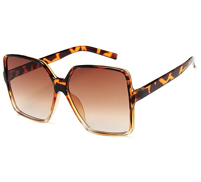 Stijlvolle InStyle™ dameszonnebril met oversized montuur en trendy gekleurde glazen, ideaal voor de zomer.