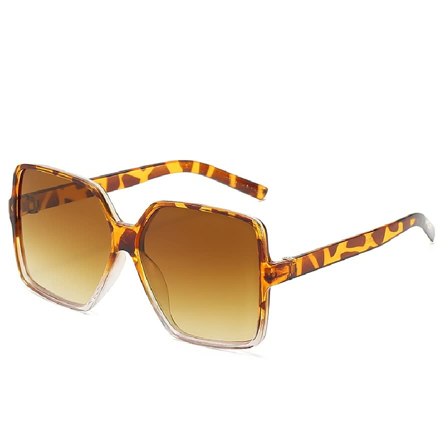 Grote trendy zonnebril voor dames met gekleurde glazen, een must-have voor elke zomerse outfit.