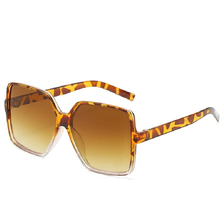 Grote trendy zonnebril voor dames met gekleurde glazen, een must-have voor elke zomerse outfit.