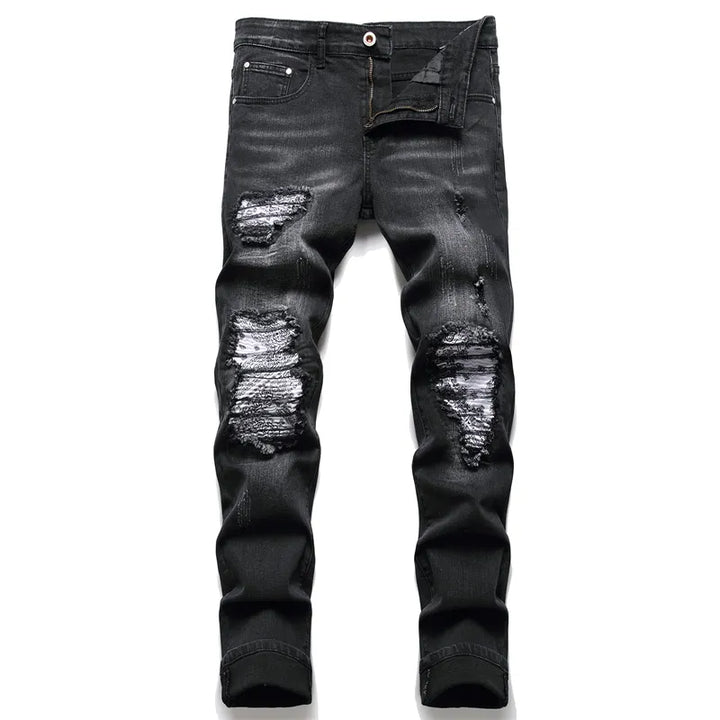 Trendy Jaxon slimfit herenjeans met modieuze scheuren, ideaal voor een casual herenmode outfit.