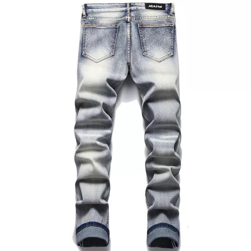 Modieuze gescheurde herenjeans Jaxon in slimfit model, een trendy vintage spijkerbroek voor moderne mannen.