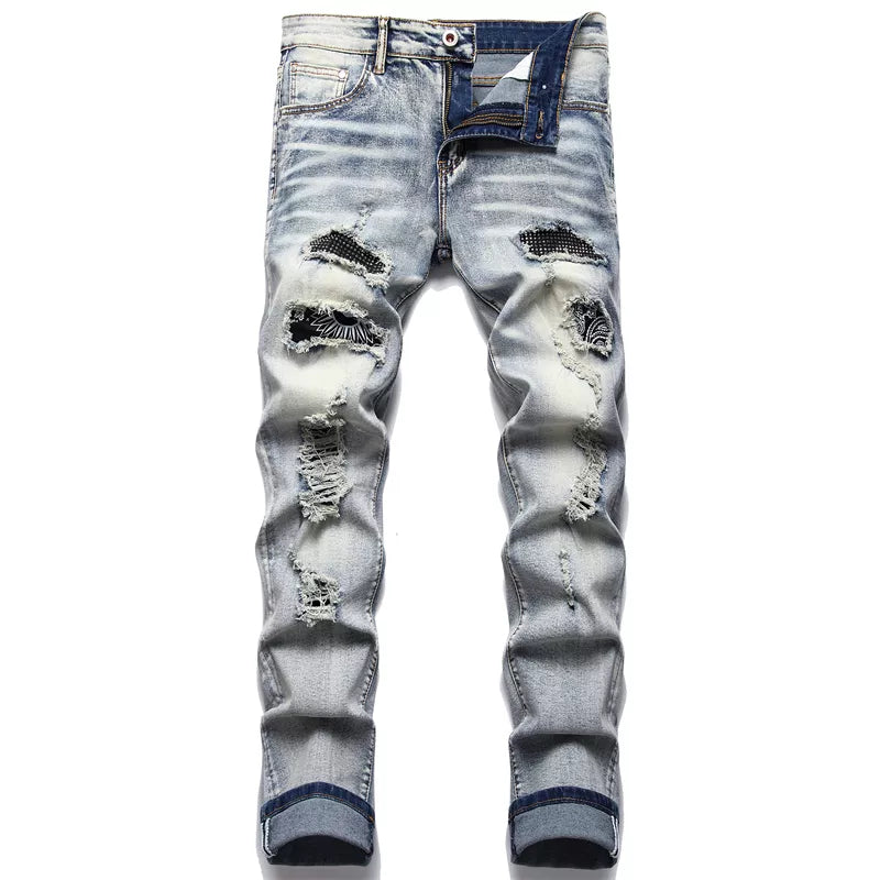 Detail van de Jaxon herenjeans, trendy gescheurde denim voor een stoere, casual look. Slimfit pasvorm.