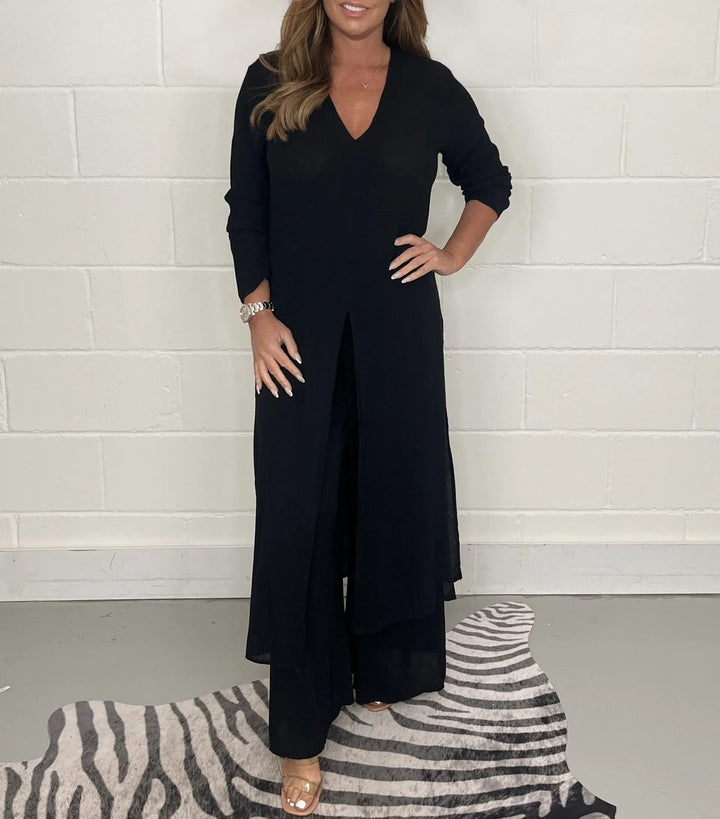 Elegante tweedelige dames outfit set met wijde broek en blouse, trendy casual zomerkleding.