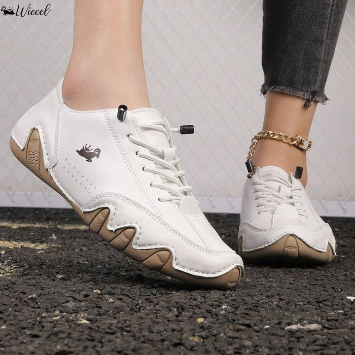 Grijze leren barefoot schoenen, uniseks. Geniet van natuurlijk en comfortabel lopen.