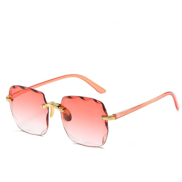 Vintage randloze zonnebril Clea voor dames & heren. Trendy uniseks model met belangrijke UV400 oogbescherming.