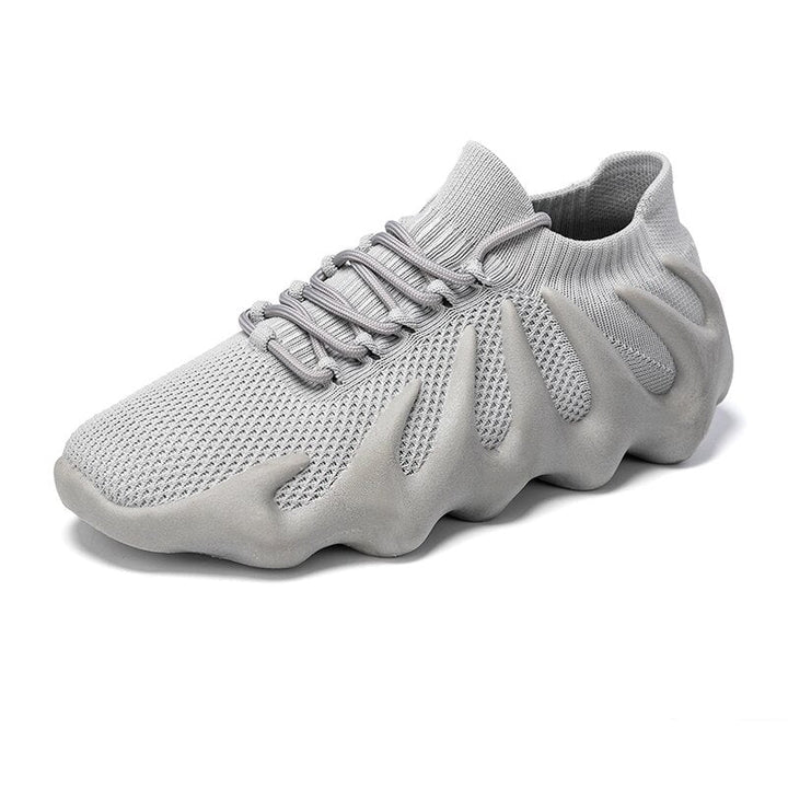 Stijlvolle lage unisex Milo sneakers, bieden comfort en ademend vermogen.