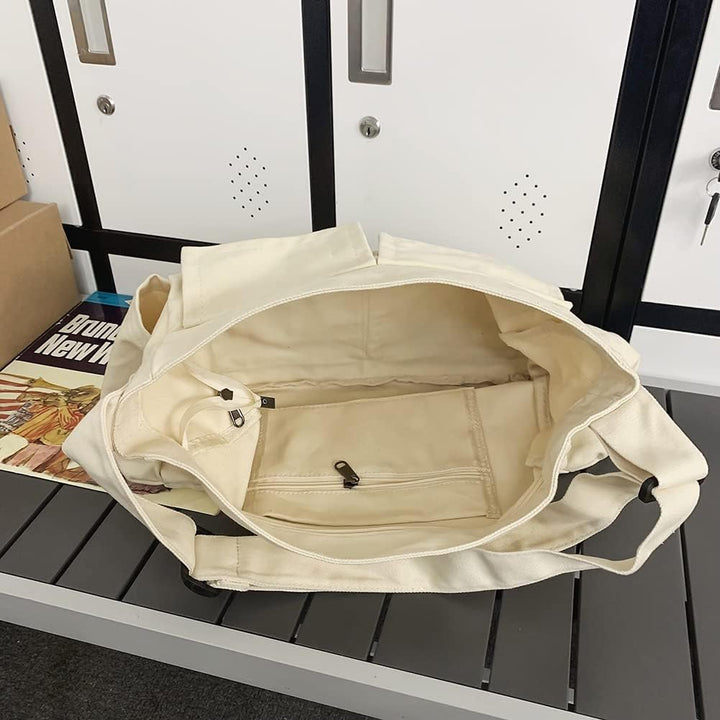 Stijlvolle groene unisex canvas crossbody tas, ruim en veelzijdig.