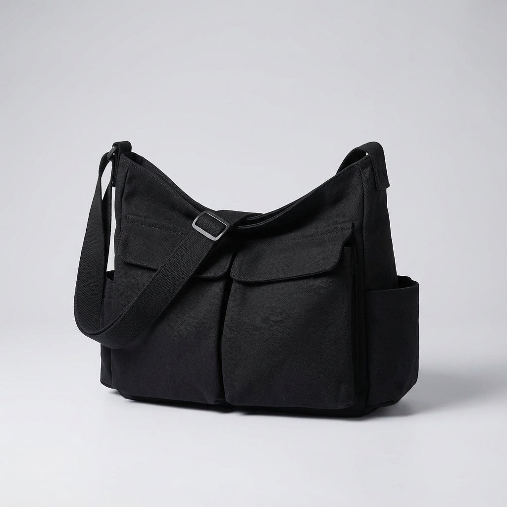 Bruine canvas schoudertas DailyMessenger, comfortabel voor lange dagen.