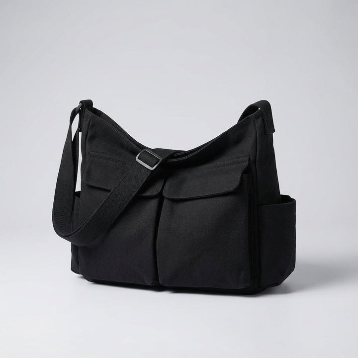 Bruine canvas schoudertas DailyMessenger, comfortabel voor lange dagen.