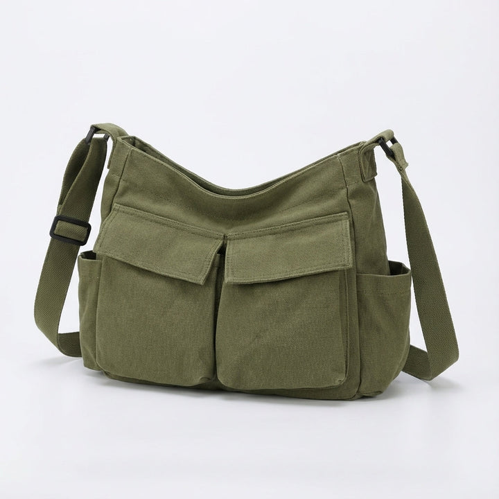 Compacte canvas messenger tas, perfect voor het georganiseerd opbergen van spullen.