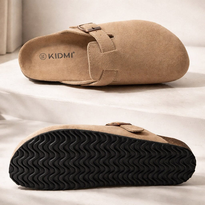Unisex klompen/slippers met gesloten neus, open hiel en verstelbare gesp; comfortabele instappers.