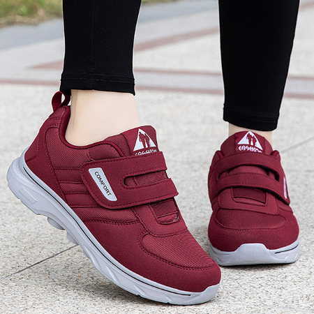 Veelzijdige EasyStride unisex schoenen met klittenband, perfect als casual, wandel- of loopschoen.