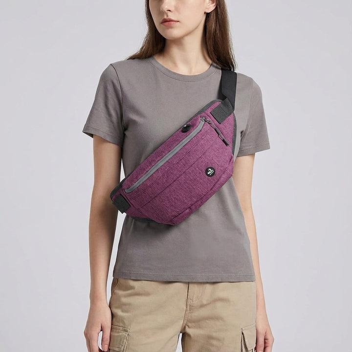 De FlexSling nylon tas: waterafstotend, veelzijdig en met veel vakken. Draagbaar als sling, heuptas of schoudertas, unisex.