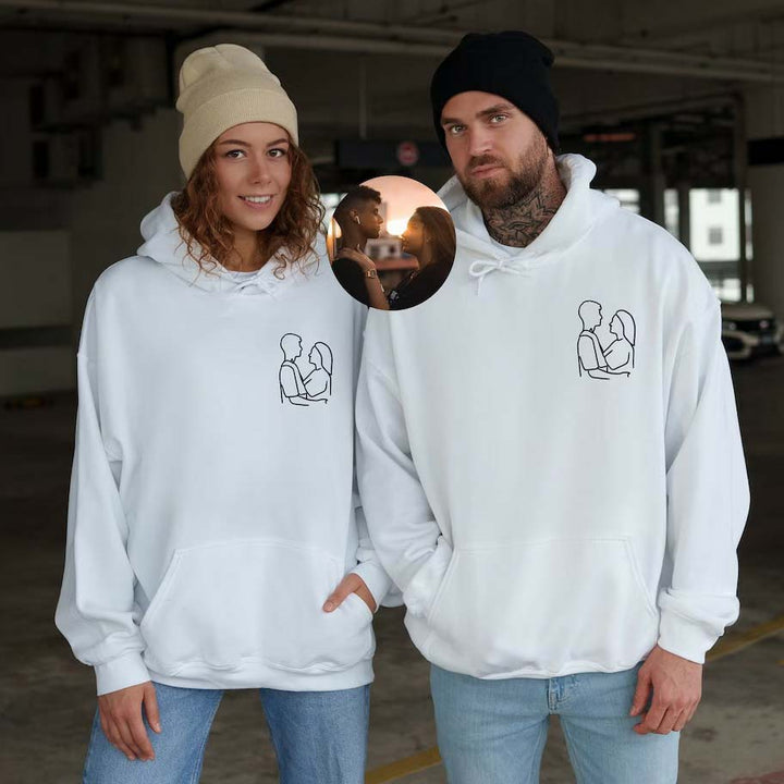 Assortiment comfortabele gepersonaliseerde unisex hoodies met fotoborduurwerk in diverse kleuren.