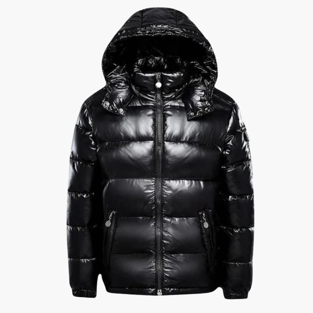 Unisex gewatteerd jack met capuchon, comfortabel en warm. Ideaal voor winter en outdoor; een stijlvolle zwarte pufferjas.