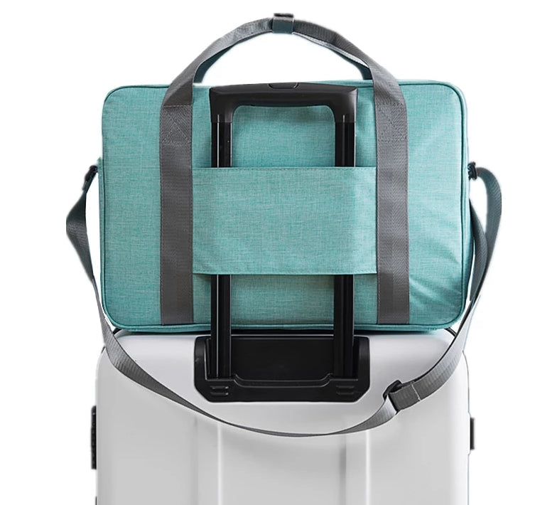 Unisex handbagage reistas met kofferbevestiging, ideaal voor comfortabel en georganiseerd reizen.