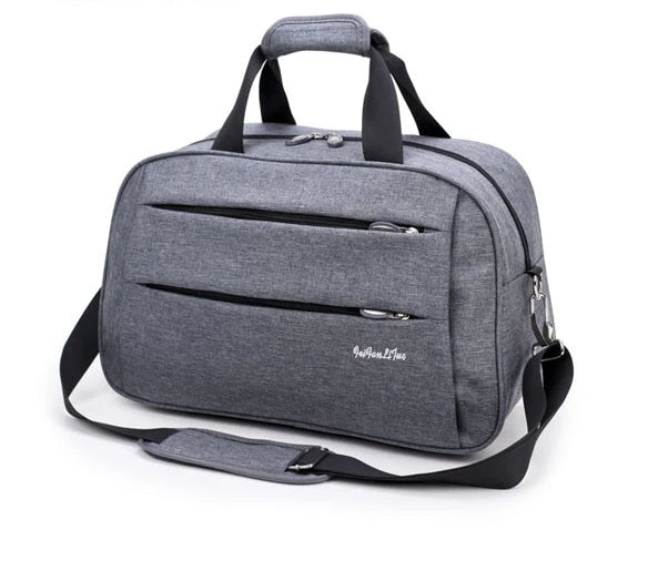 Ideale handbagage reistas voor zakenreizen of vakanties, compact design en unisex pasvorm.