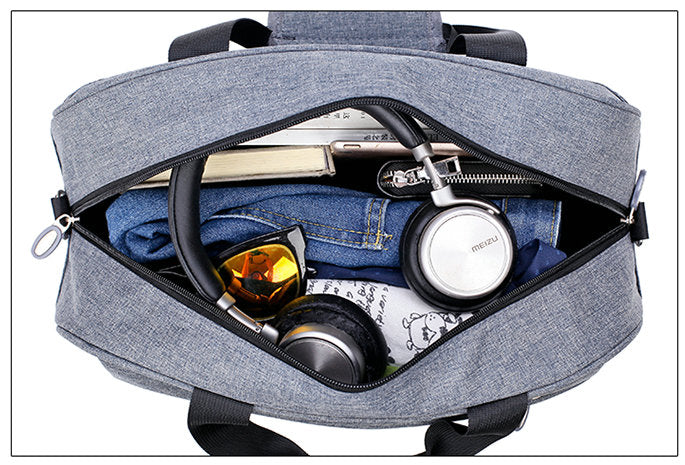 Stijlvolle zwarte unisex reistas, compacte handbagage voor comfortabel en zorgeloos reizen.