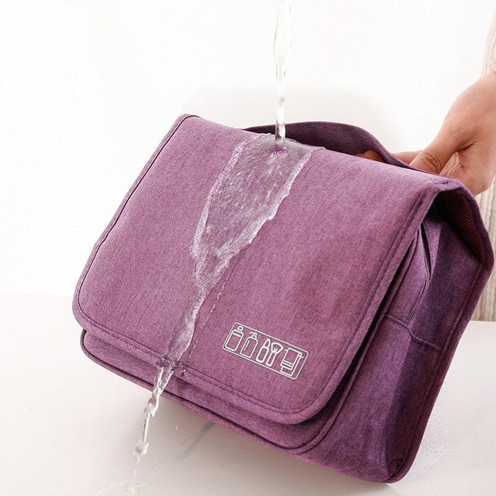 Detail van waterdichte unisex reistoilettas organizer, met focus op sterke ritsen en duurzaam materiaal voor reizen.