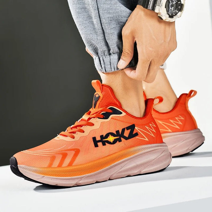 Robuuste unisex hardloopschoenen met duurzame buitenzool en uitstekende grip op diverse ondergronden.