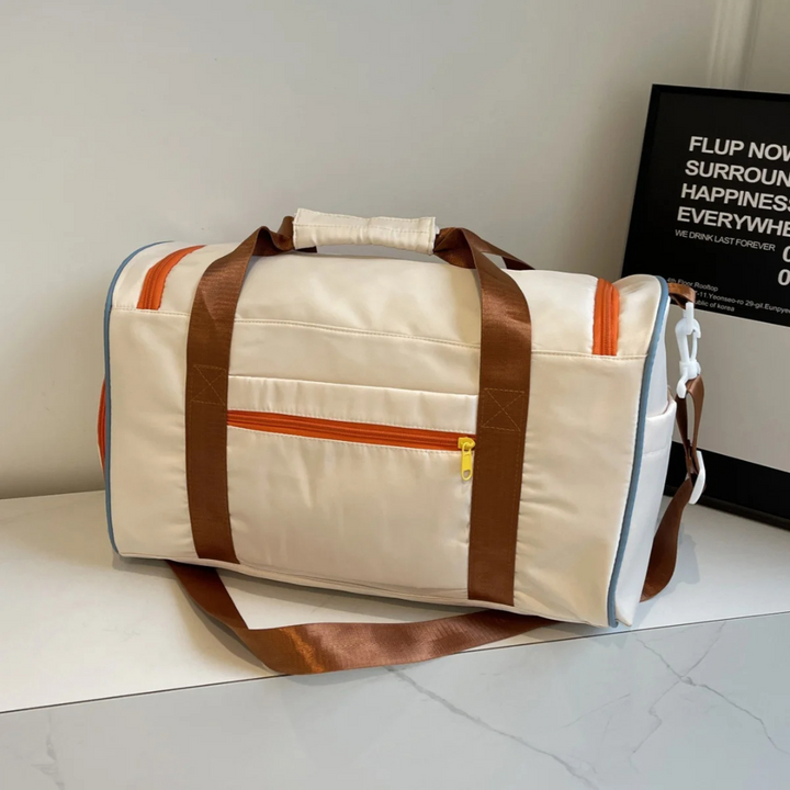 Unisex FlexaBag duffeltas met kleurblokken, comfortabel te dragen; ideaal als lichtgewicht sport- of reistas.