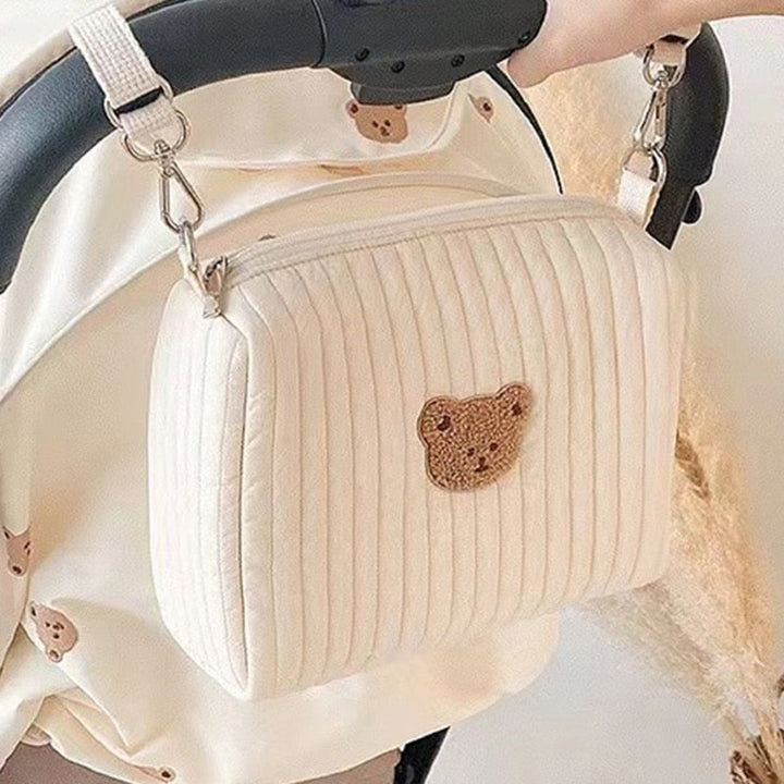 Uitwasbare luiertas met neutraal beertjesdesign, duurzaam en handig voor dagelijks babygebruik.