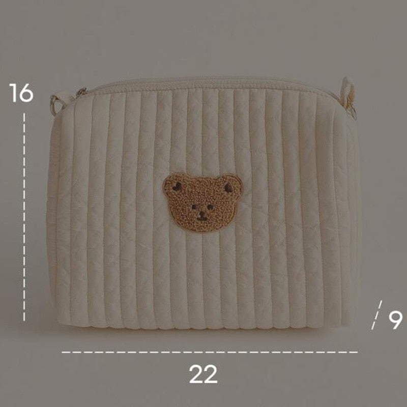 Ruime unisex luiertas met beertjesdesign, praktisch met meerdere opbergvakken voor babyverzorging.