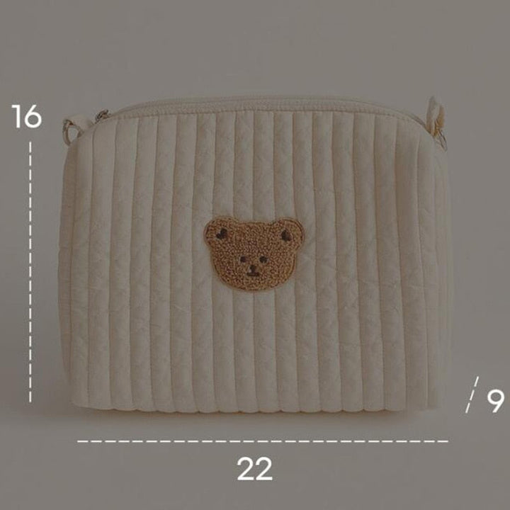 Ruime unisex luiertas met beertjesdesign, praktisch met meerdere opbergvakken voor babyverzorging.