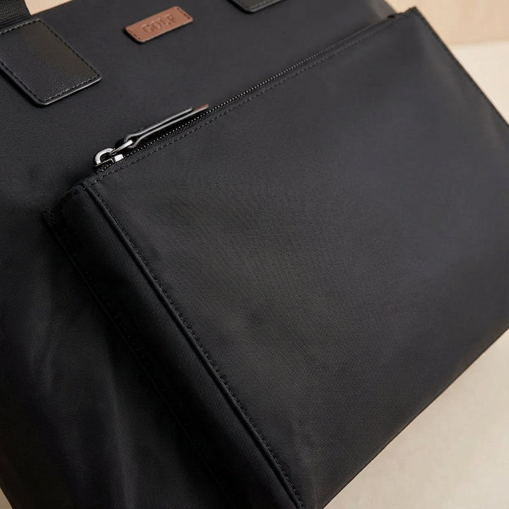 Georganiseerde zakelijke laptoptas MetroBrief van canvas, met aparte vakken voor documenten en laptop.