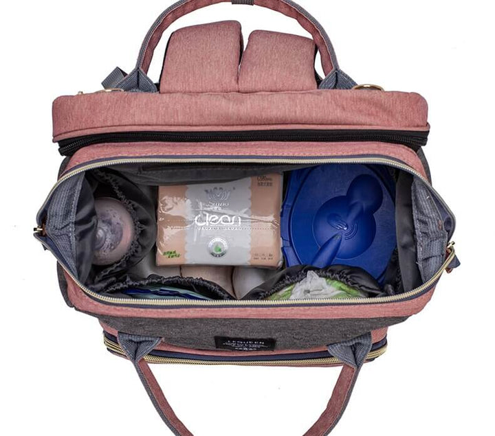 Multifunctionele reisrugzak die eenvoudig verandert in een comfortabel opvouwbaar babybedje.