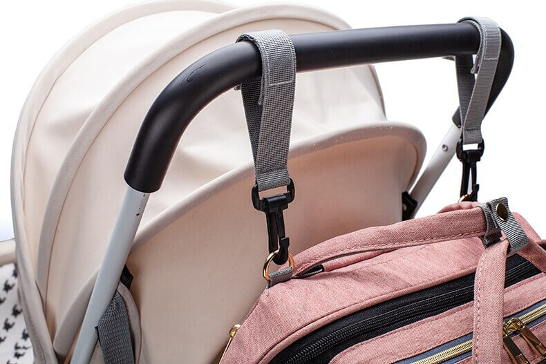 Babytas met handige opbergvakken & geïntegreerd draagbaar babybed, waterdicht design voor ouders.