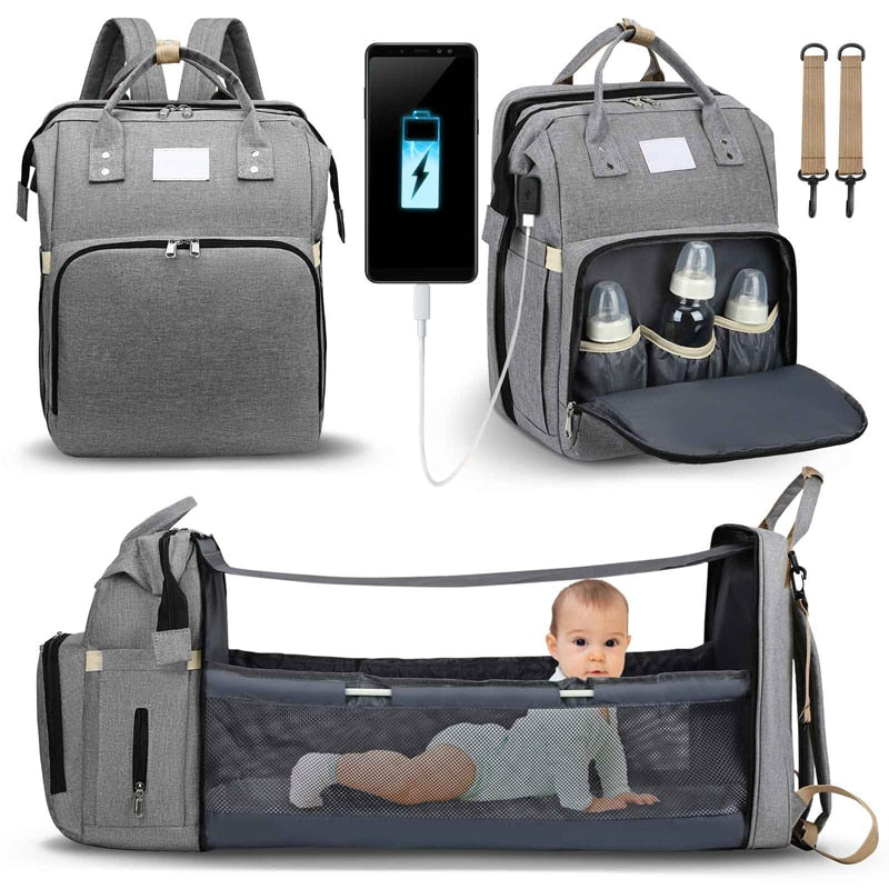 Praktische luiertas voor ouders, transformeerbaar in een comfortabel draagbaar babybed voor baby's.