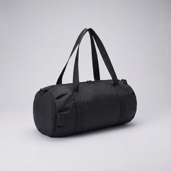 Spatwaterdichte TravelFoldr duffel, opvouwbare unisex sport- en weekendtas, robuust en met speciaal natvak.