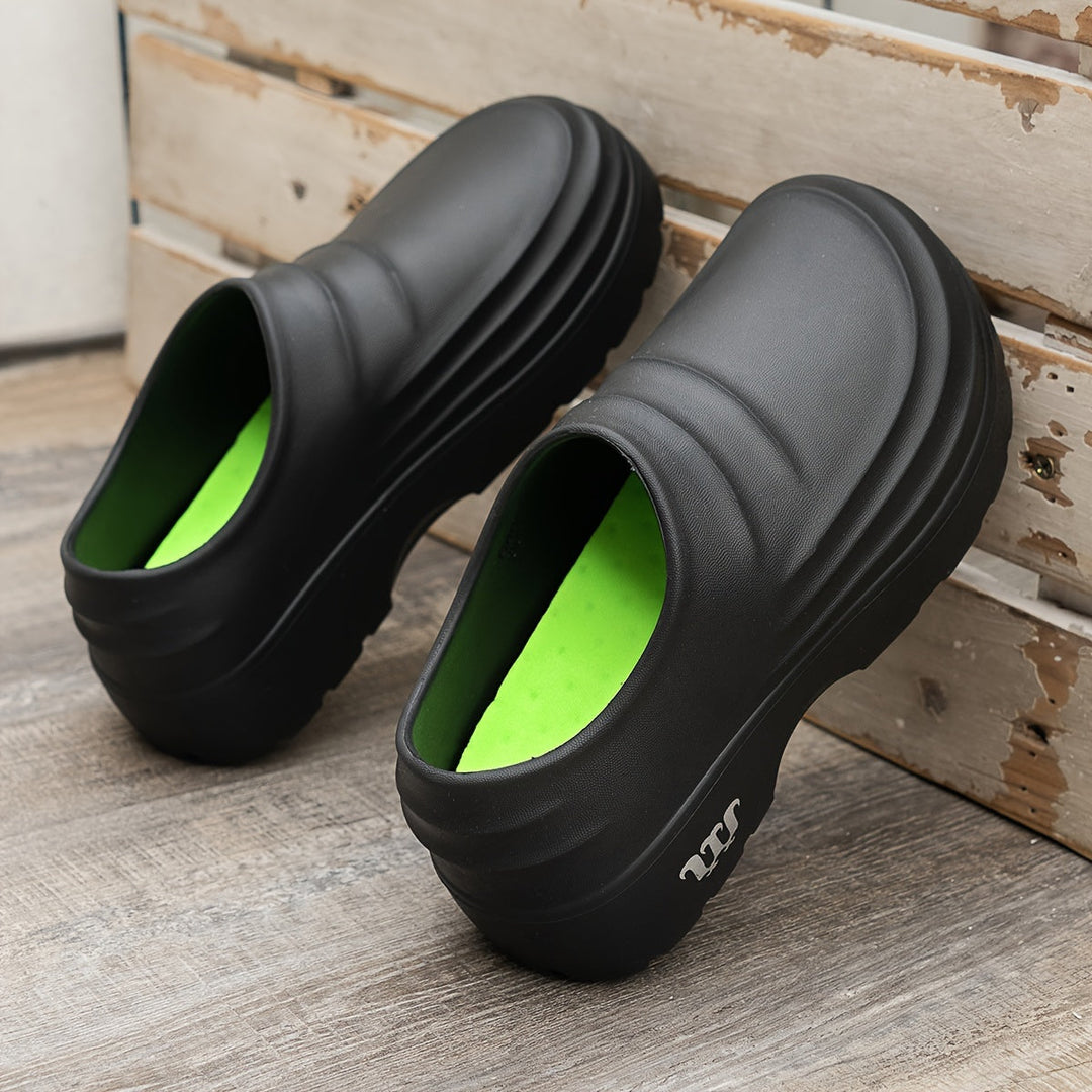Unisex orthopedische AquaStep klompen, waterdicht voor optimaal comfort en ondersteuning.