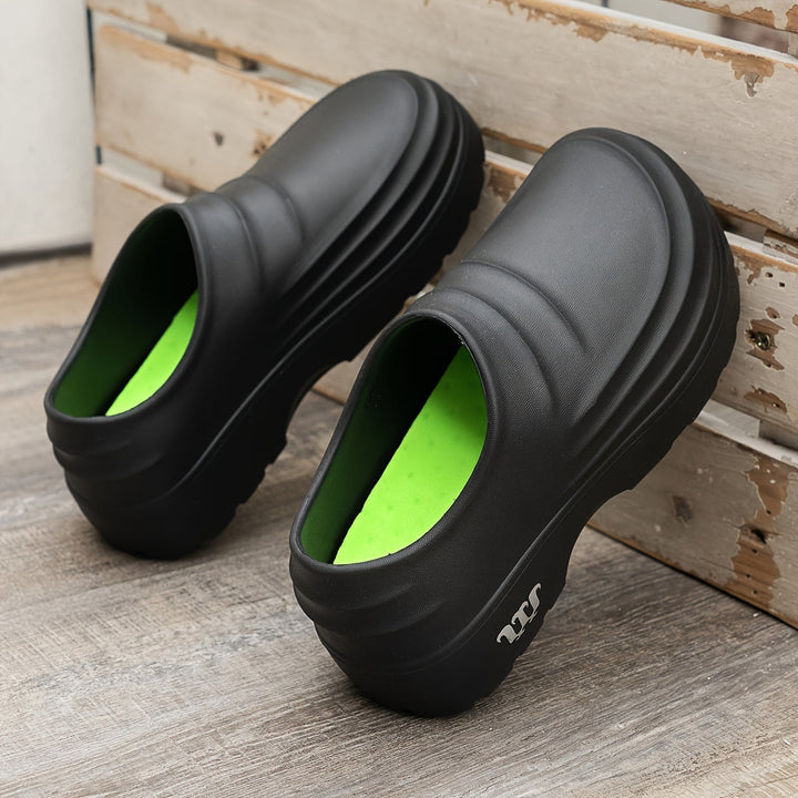Unisex orthopedische AquaStep klompen, waterdicht voor optimaal comfort en ondersteuning.